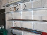 a shelf that has a bunch of different items on it