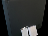 a picture of a black folder with two clips attached to it
