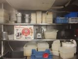 many containers and containers on the shelves in the kitchen