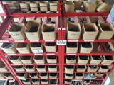 many boxes on the shelves of a store with labels on them