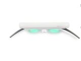 une image représentant une paire de lunettes sur laquelle sont fixées des lumières vertes