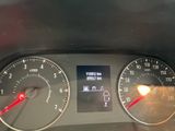a close up of a car dashboard with a speedometer and gauges