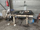 a workbench with tools on it in a garage