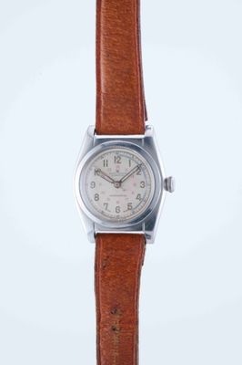 an image of a wrist watch with a brown leather strap