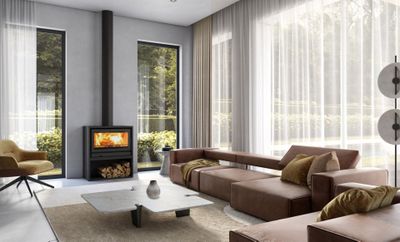 a living room with a couch, chair, coffee table and a fire place