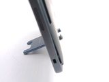 a close up of a cell phone on a stand