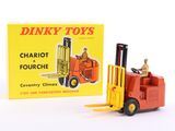 an image of a toy forklift truck with a box on the back
