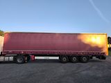 a semi truck that is parked in a parking lot