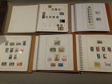 a lot of different stamps on the pages of a book
