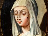 portrait of a woman in a green dress with a white veil
