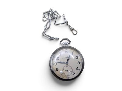 a silver pocket watch on a chain on a white surface
