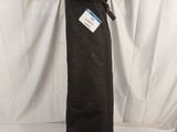 a large black bag sitting on top of a white table
