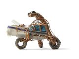 a sculpture of a motorcycle with a man on it