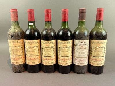 six bottles of wine are lined up in a row