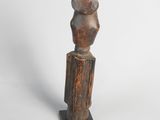 an image of a wooden sculpture of a woman ' s head on a stand