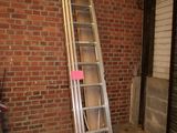 a ladder leaning against a brick wall in a garage