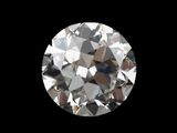 a close up of a diamond on a black background