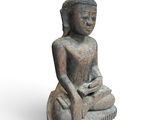 statue of a seated buddha on a white background