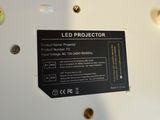 a close up of a laptop with a label on it