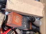 a cardboard box full of wine bottles and other wine bottles