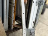 a close up of a metal door with a handle on it