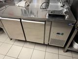 a stainless steel counter in a commercial kitchen