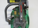 a picture of a chainsaw sitting on a table