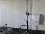a sink and a faucet in a small kitchen
