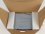 a cardboard box with a piece of cloth inside of it