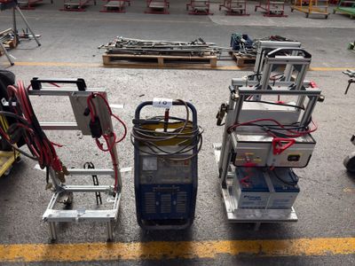 two carts that are sitting in the middle of a parking lot