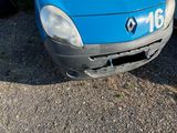 a picture of a blue van parked in a parking lot