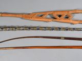 several different types of wood and metal items on a white surface