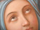 an image of a painting of a woman with a blue head scarf