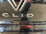 a close up of a car ' s emblem on the front of it