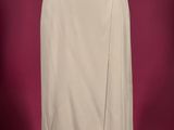 a woman ' s beige skirt on a mannequin mannequin mannequin mannequin mannequin mannequin mannequin mannequin