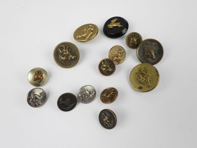 several different types of buttons on a white surface