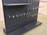 an image of a metal shelf with a bunch of items on it
