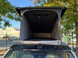 a car that has a tent on top of it