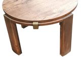 a small wooden table with a metal handle on it