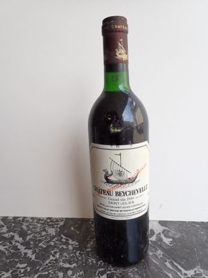 a bottle of wine that is sitting on a table