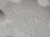 an image of a white porcelain vase with writing on it