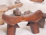 several pieces of wood sit on a white surface next to each other