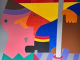 a colorful painting on the wall of a building