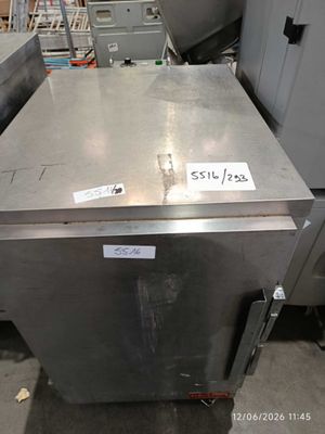 a stainless steel dishwasher that is sitting in a room