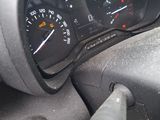 a close up of a car dashboard with a speedometer