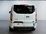a white van that is parked in a room