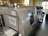 une machine qui se trouve à l'intérieur d'un bâtiment