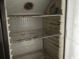 an open refrigerator with a lot of food inside of it