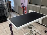 a black and white table in the middle of a room