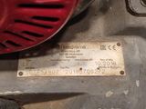 a picture of a close up of a metal plate on a motor